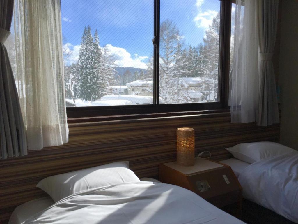 Hakuba Landmark Iwatake Lodge Экстерьер фото